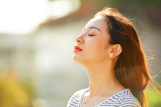 Woman enjoying fresh wind