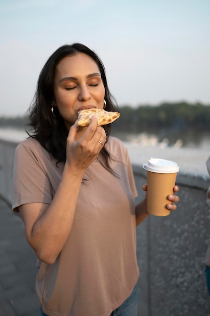 Woman enjoying some street food