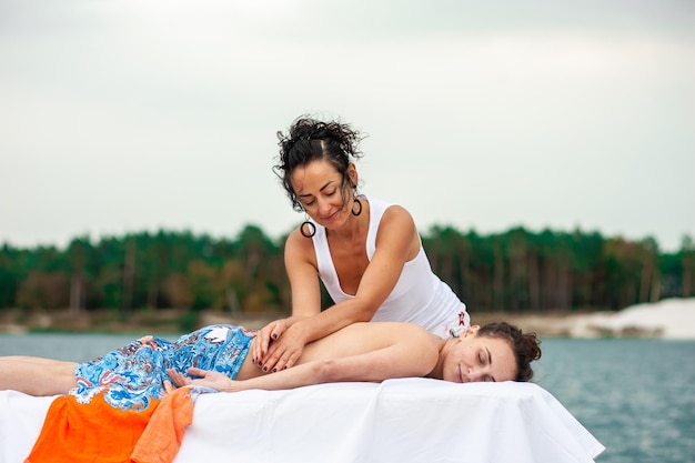 Woman enjoying traditional Thai massage