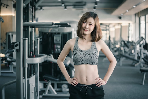 Woman exercise in the fitness gym.  