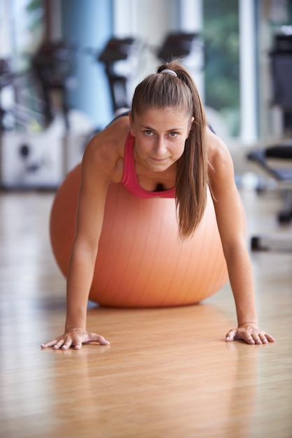 woman exercise pilates in fitness gym club