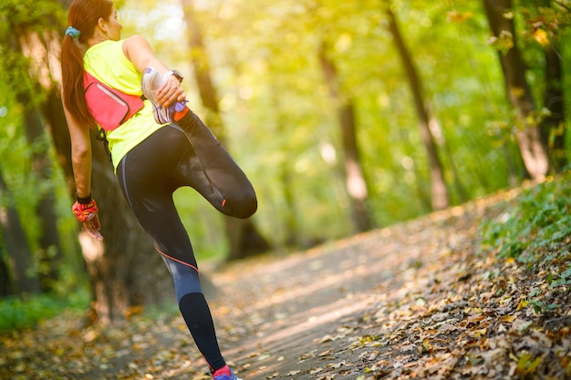 Woman exercising and stretching muscles