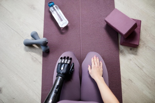 Woman exercising with sports equipment