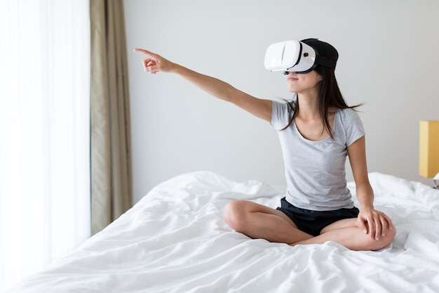 Woman experience VR at home