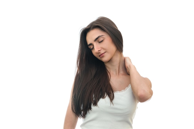 Woman filling ache in neck isolated on white