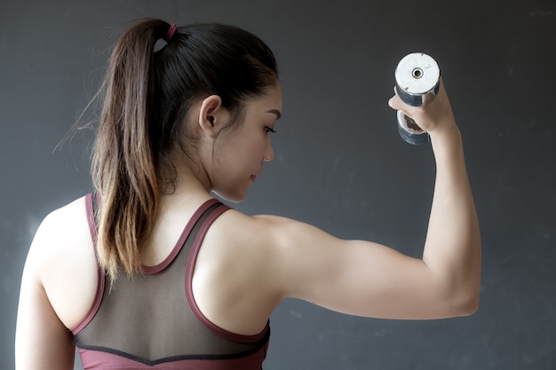 Woman in fitness gym