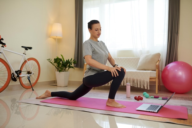 Woman Following Workout Video