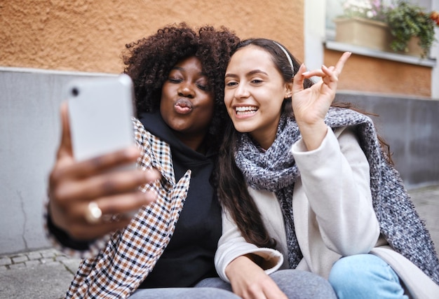 Woman friends and selfie in the city for profile picture friendship memory or social media influencer Happy women smile for photo online post or vlog in travel journey or trip in a urban town