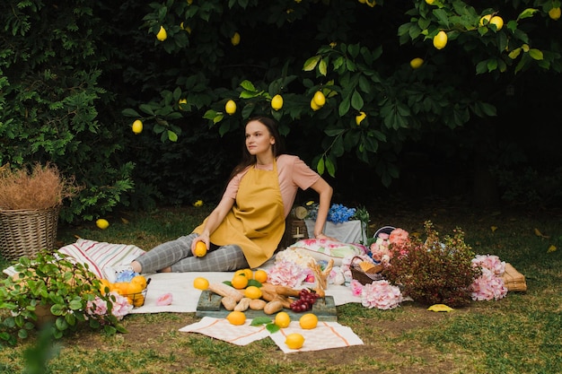 Woman in the garden on a picnic