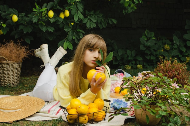 Woman in the garden on a picnic