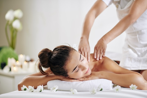 Woman getting back massage