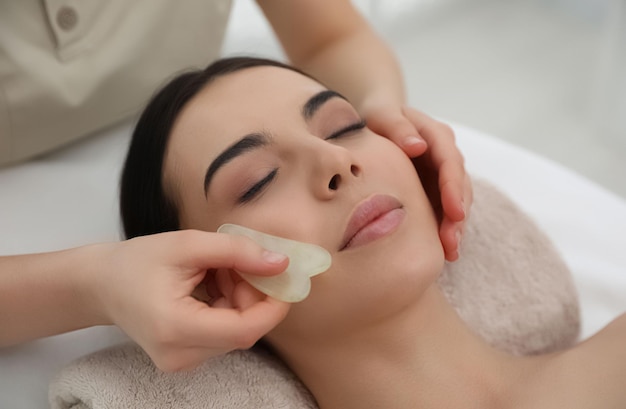 Woman Getting a Facial Massage in the Spa 253