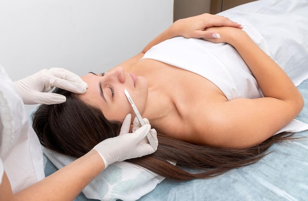 Woman Getting a Facial Massage in the Spa 3