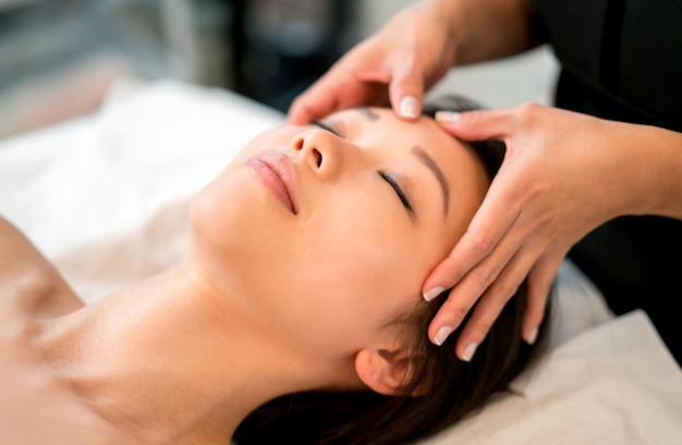 Woman Getting a Facial Massage in the Spa 56