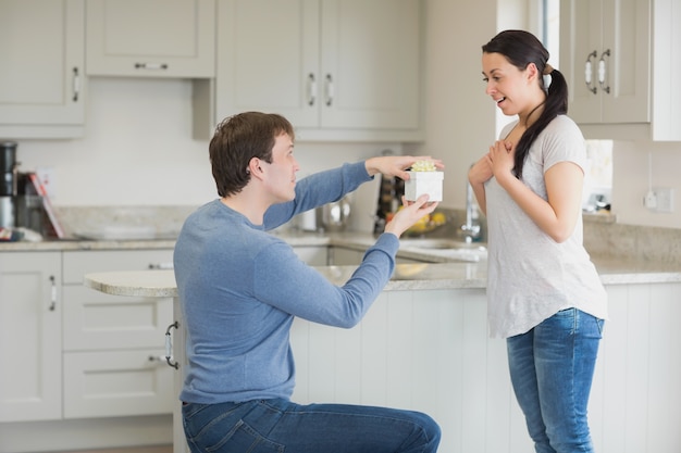 Woman getting a present from husband