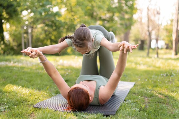 Woman and girl training together