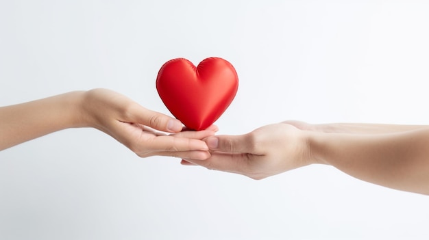 Woman gives red heart to man on white background