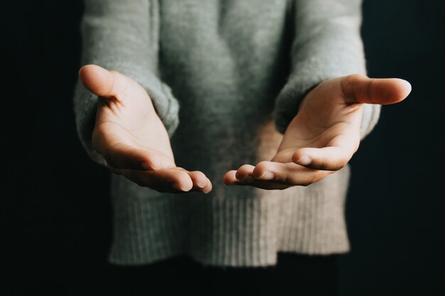 Woman giving hands, help and self help concept, mental health