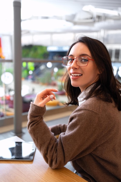 Woman in glasses with tablet computer