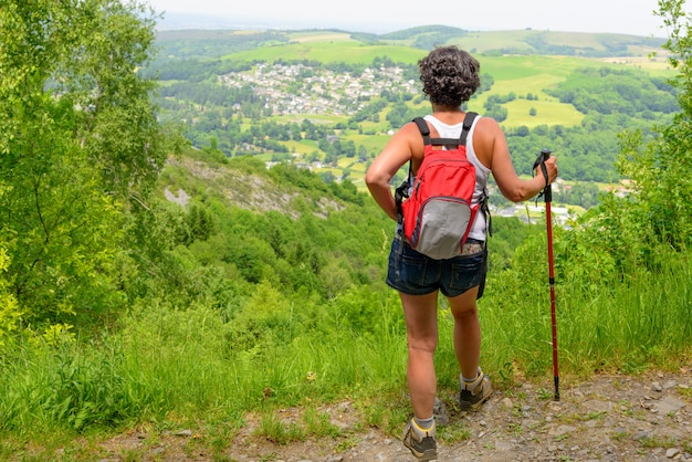 Woman go hiking in the mountains