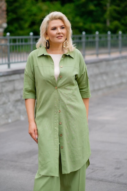 Woman in green suit outdoors