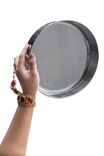 Woman hand holding Karwa Chauth strainer