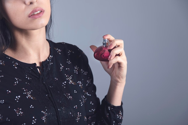 Woman hand perfume