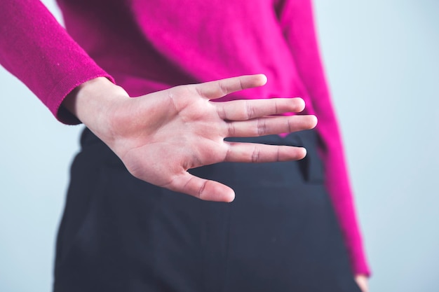 Woman hand stop sign