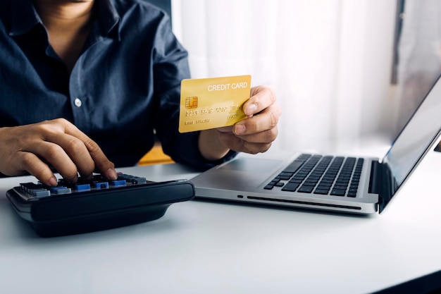 Woman hand using mobile smart phone online payment banking and online shopping at the home