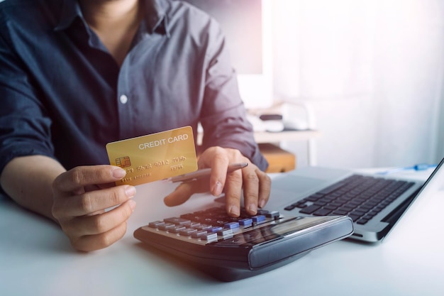 Woman hand using mobile smart phone online payment banking and online shopping at the home