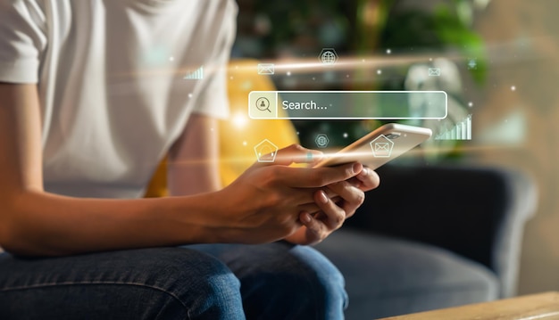 Woman hand using smartphone and press screen to search Browsing on the Internet online.