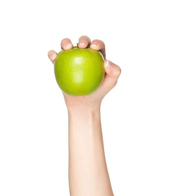 Woman hand with green apple isolated on white background