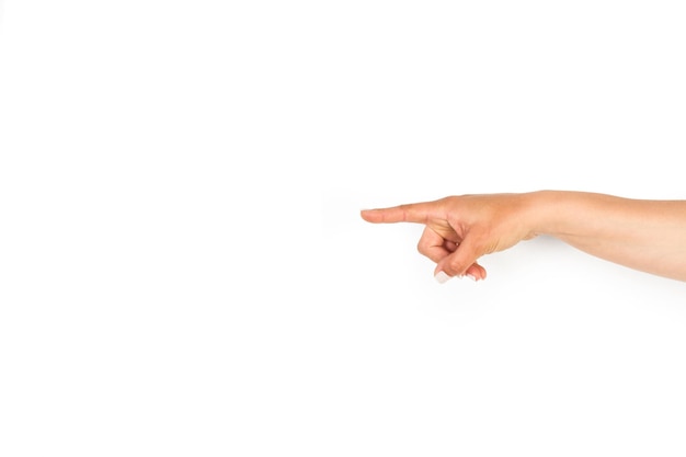 Woman hand with pointing finger on a white background with copy space