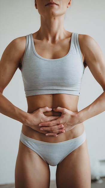 Photo woman hands and stomach for nutrition in studio on white background with underwear