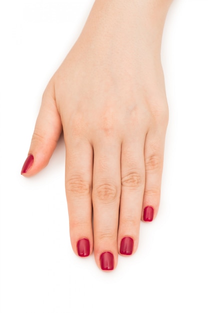 Woman hands with red nail isolated on white