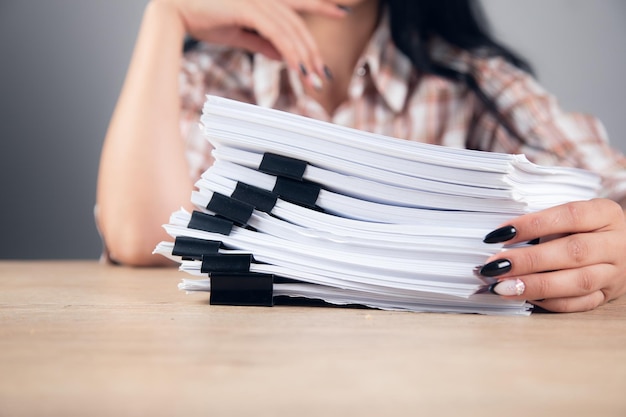 Woman hands working in Stacks paper files