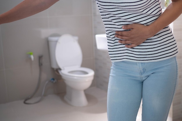 Woman have contraction and stomach pain diarrhea concept