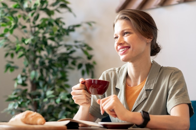 woman having coffee