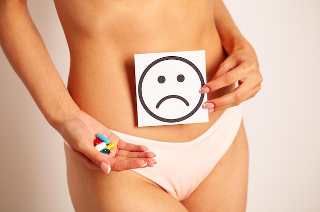 Woman Health Female Body Holding Sad Smile Card Near Stomach