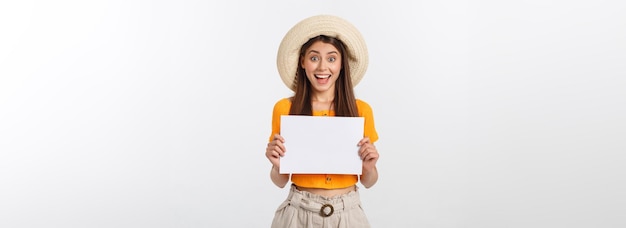 Woman holding blank card isolated on white background smiling female portrait