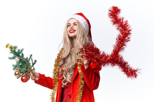 Woman holding a Christmas tree decoration holiday fun Studio