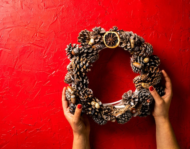 Woman holding Christmas wreath