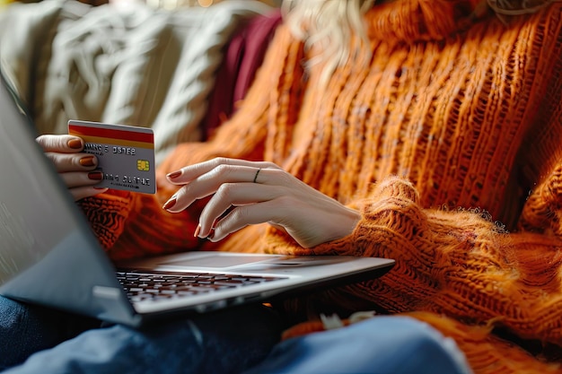 Woman Holding Credit Card and Shopping Online on Laptop