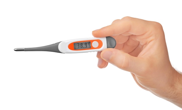 Woman holding digital thermometer on white background