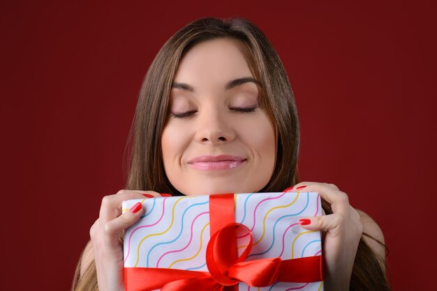 Woman holding gift in hands