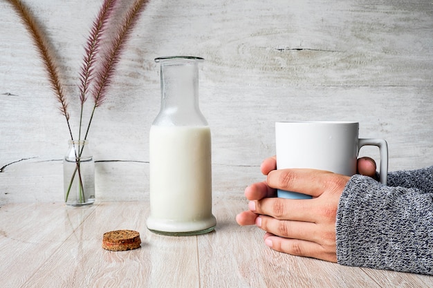  woman holding a glass of milk, health care concept.