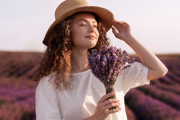 Woman holding lavender medium shot