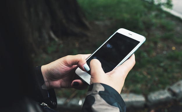 Woman holding mobile phone