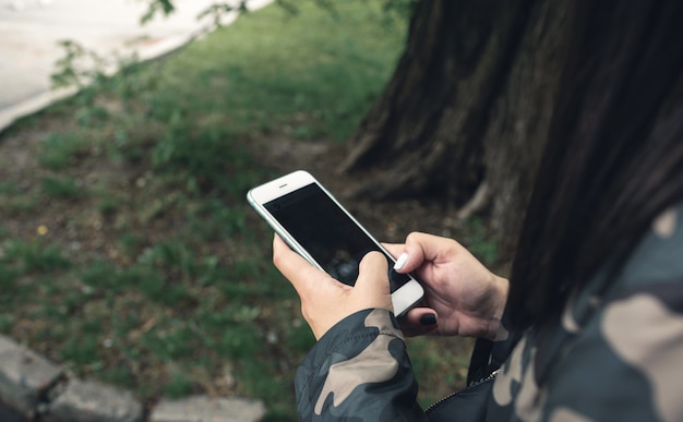 Woman holding mobile phone