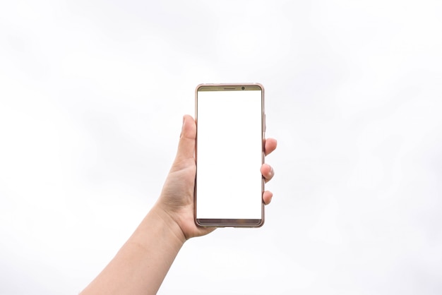 Woman holding phone showing blank screen